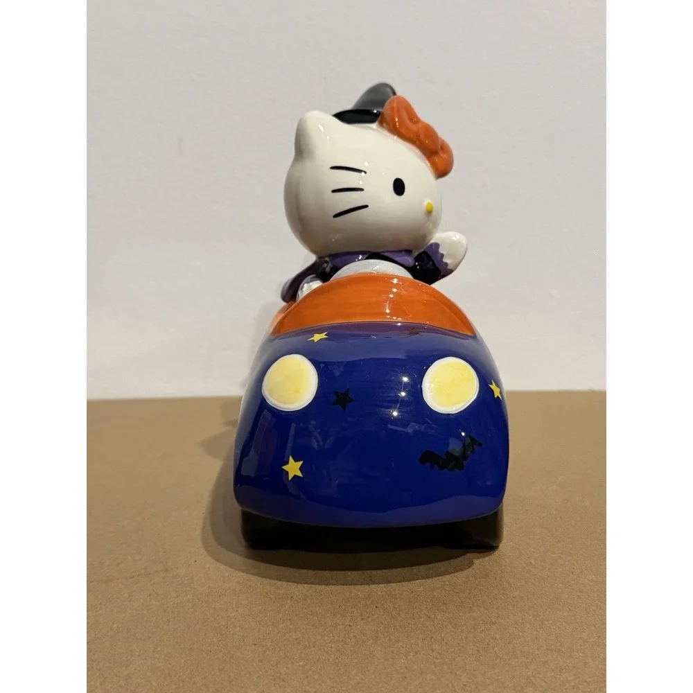 Hello Kitty Blue Sky Halloween Cute Ceramic Witch in Purple Car Orange Bow